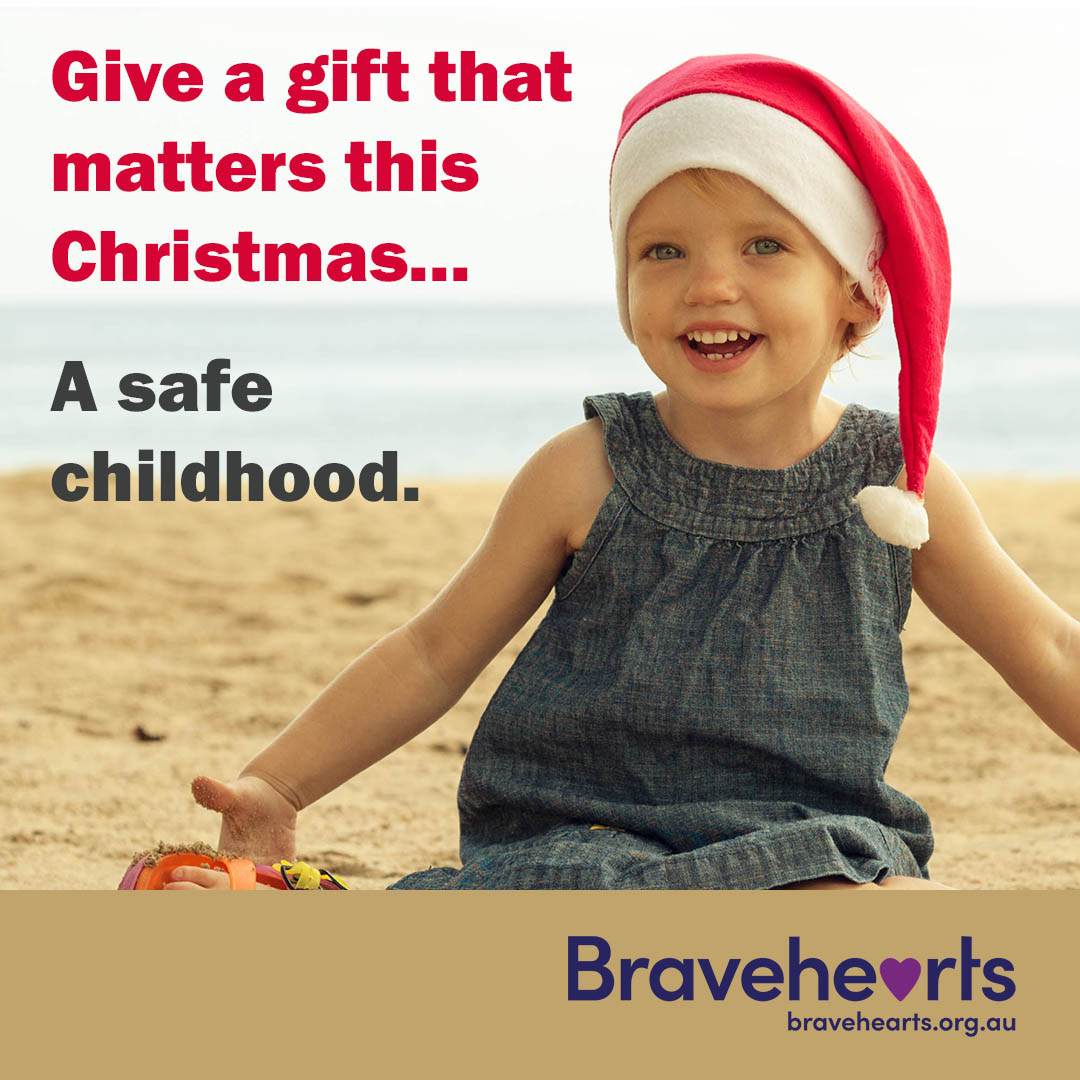 girl child on beach in santa hat - Bravehearts christmas appeal